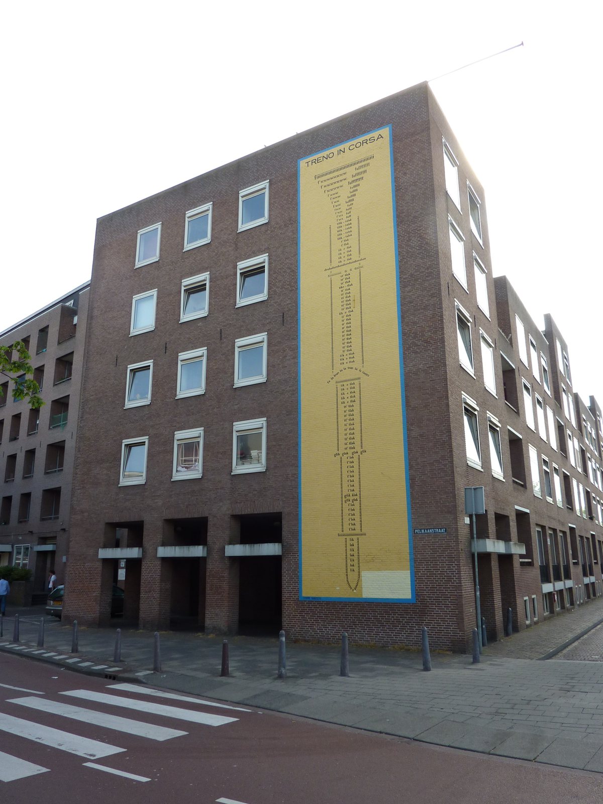 A wall poem painted on a facade on the Pelikaanstraat in Leiden